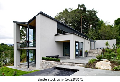 Front view of modern designed concrete residential house in western Norway