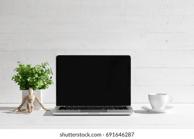 The front view of notebook and cup of coffee. Inspiration and mock-up concept