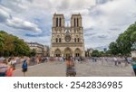 Front view of Notre-Dame de Paris timelapse hyperlapse. Medieval Catholic cathedral on the Cite Island in Paris, France. Long queue of tourists at the entrance. Cloudy sky at summer day