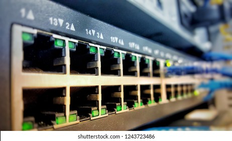 Front View Of Old Communication Switch Which Are Used In Data Center. Networking Concept And Information Technology.