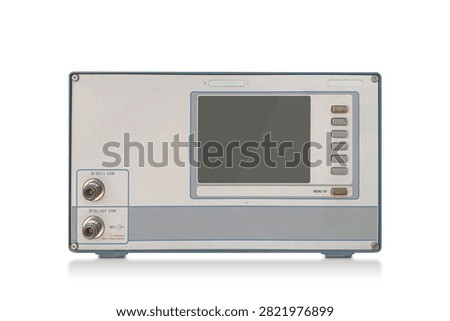 front view old white and blue electronic Radio Frequency signal testing and measuring device resting on isolated background, object, decor, technology, collection, copy space