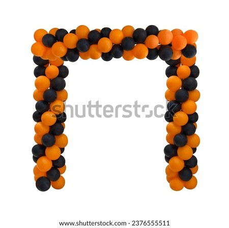 Front view orange and black halloween balloon arch isolated on white background