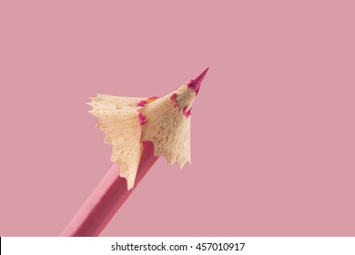 Front view of pink pencil with wooden shaving on top - Powered by Shutterstock