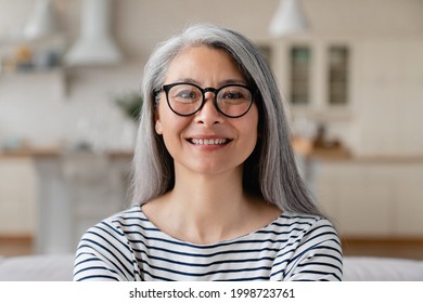 Front View Portrait Of A Mature Teacher Freelancer Woman Mother Businesswoman On Video Online Conference Call Meeting , Middle-aged Tutor Conducting Lessons Online