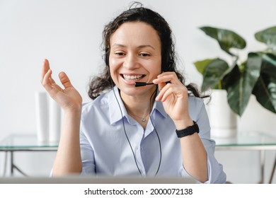 Front View Portrait Of A Video Call Of Mature Middle-aged Businesswoman IT Support Hot Line Worker On Conversation Online. Female Tutor Teacher Lecturer Conducting Lessons Remotely