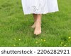 feet in field of flowers