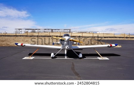 A Front View of a Propeller Powered Air Racing Plane