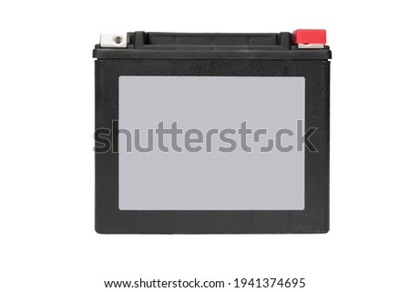 Front view of rechargeable starter lead-acid battery for motorcycle or snowmobile. Positive terminal is shut with red cap. Isolated on white background. Space for logo