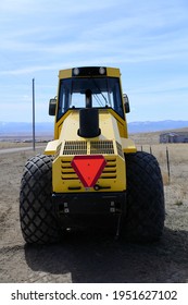 Front view of a road roller at rest
