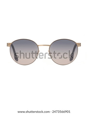 Front view of round Panto shaped sunglasses in metallic gold frames with purple-pink lenses on a white background close up