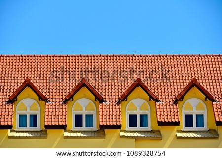 east coast windows front view of row dormer windows on the tiled roof townhouse against view row dormer windows on stock photo edit now 1089328754 east coast windows front view of row dormer windows on the tiled roof townhouse against view row dormer windows on stock photo edit now 1089328754