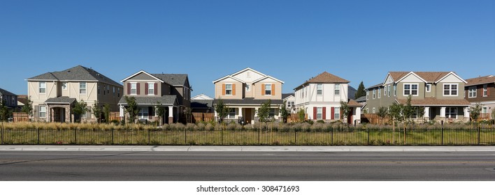 A Front View Of A Row Of New Houses.