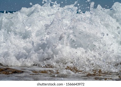 Front view of sea waves splashes. Close up