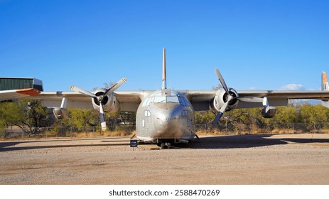 A Front View of a Small Twin Engine Military Transport Airplane
