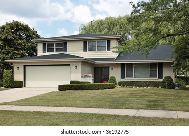 Front View Of Split Level Suburban Home