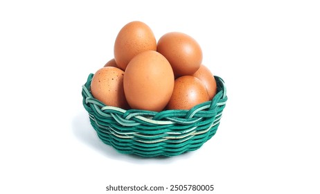 Front view Stack of fresh chicken egg in green basket wicker bamboo. Isolated on white background with copy space. Suitable for editing and used for food and nutrition advertising. Clipping path. 
