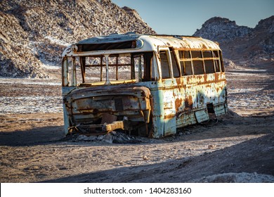 Front view sunset at the abandoned bus in the desert of Atacama, Chile - Powered by Shutterstock