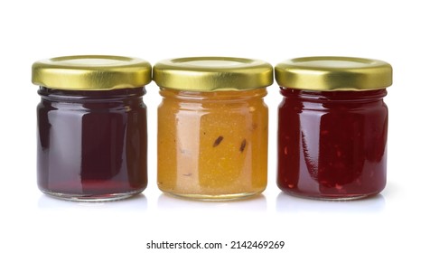 Front view of three different jam jars isolated on white