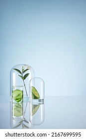 Front View Of Transparent Podium With Laboratory Equipment And Cucumber In Blue Background Science Content