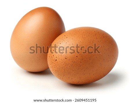 Front view of two brown chicken eggs isolated on white with clipping path, perfect for packaging and food content.