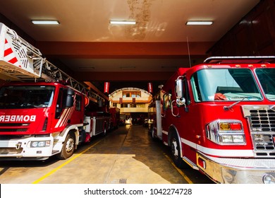 Front view of two fire engines in fire station of Lima, Peru - Powered by Shutterstock