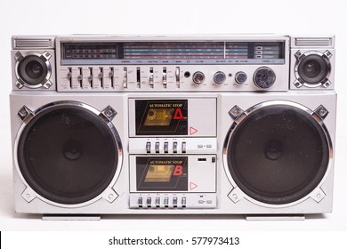 Front View Of A Vintage Boom Box Cassette Tape Player Isolated On White Background.