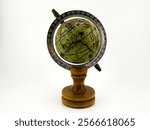 Front View of Vintage Miniature Globe with Wooden Base and Metal Latitude Indicator