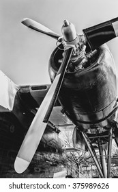 Front view of vintage propeller driven airplane