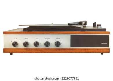 Front view of a vintage turntable with knobs isolated on a white background