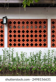 front view of a wall with ventilation brick