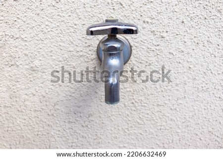 Front view of water faucet