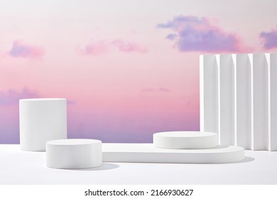 Front view white podium   stairway and blank space in purple gradient cloudy sky background abstract content