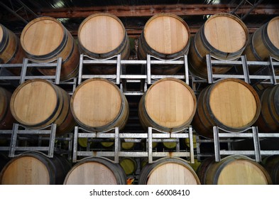 Front View Of Wine Barrels In Storage At A Winery In The Adelaide Hills, South Australia.