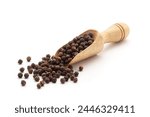 Front view of a wooden scoop filled with Organic Black pepper (Piper nigrum). Isolated on a white background.