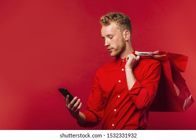 Front view young man checking his phone