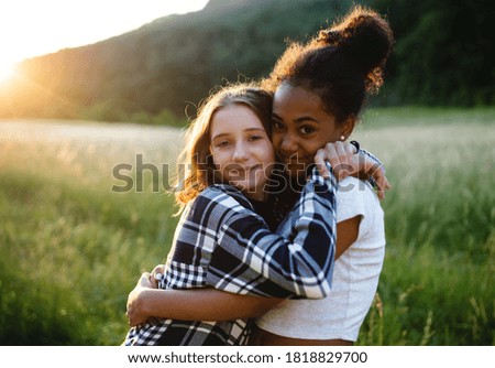 Similar – Image, Stock Photo two beautiful teenager girls floating in a pool