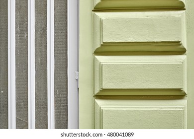 Front wall with door, regular shape architecture background.