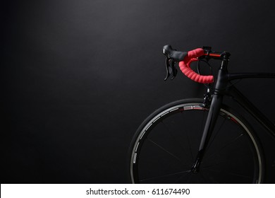 front and wheel of black race road bike