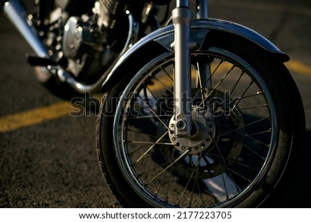 Similar – Image, Stock Photo Wheel and exhaust pipe of motorcycle on road