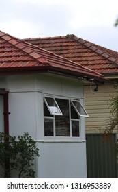 The Front Windows Of A Fibro - Asbestos House. (fibrous Cement Sheet)