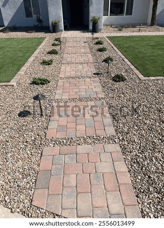 Front yard landscape with pathway 