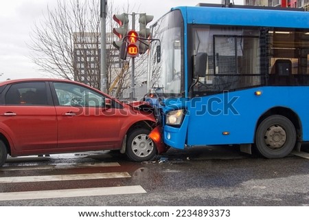 Frontal collision of a car and a bus.  Head-on collision between bus and car. Car accident. Traffic accident.                                 