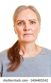 Frontal face of an old serious woman