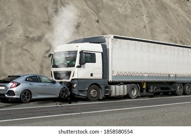 Frontal Impact Between A Car And A Truck. Car Accident.