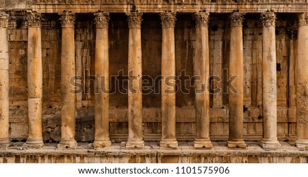 Frontal view of a colonnade - Row of columns of an ancient Roman temple ruin (Bacchus temple in Baalbek)
