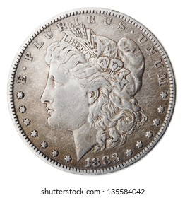Frontal view of the obverse (heads) side of a silver dollar minted in 1883, known by the name 'Morgan Dollar'. Depicted is a profile portrait representing liberty. Isolated on white background.