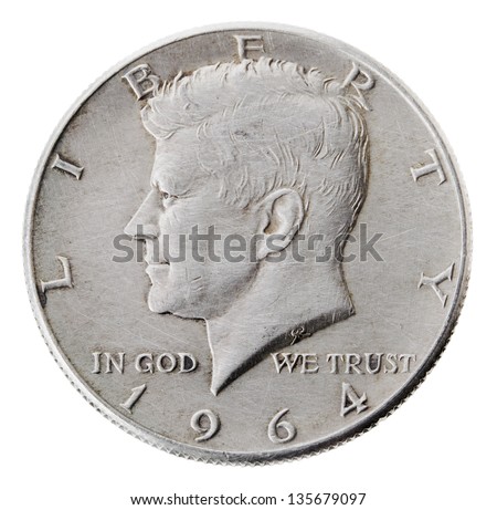 Frontal view of the obverse (heads) side of a silver half Dollar minted in 1964.Depicted is a profile portrait of John F. Kennedy and comes to honor his memory. Isolated on white background.