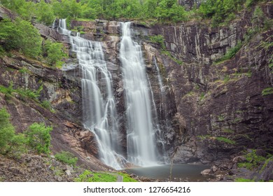 Frontal view of the Skjervsfossen in long exposure, seen from the base - Shutterstock ID 1276654216