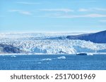 The frontside of the  famous eqip  sermia glacier, one of the most active glaciers of the world, calving regularly