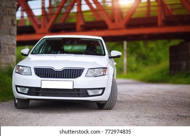 Front-side view of a car on nature background